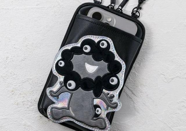 発売前に重版！「黒ミャクミャク」のスマホポシェット、今すぐ予約しなきゃ。